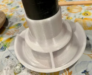 3D printed chicken feeder fitted with drainage pipe