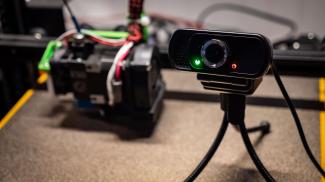 Webcam on tripod on 3D printer bed